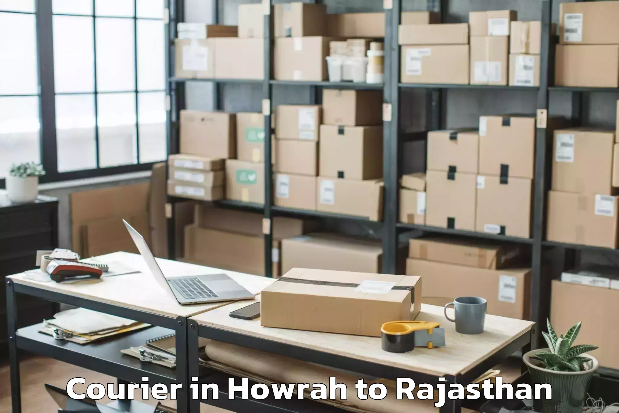 Book Howrah to Udaipur Airport Udr Courier Online